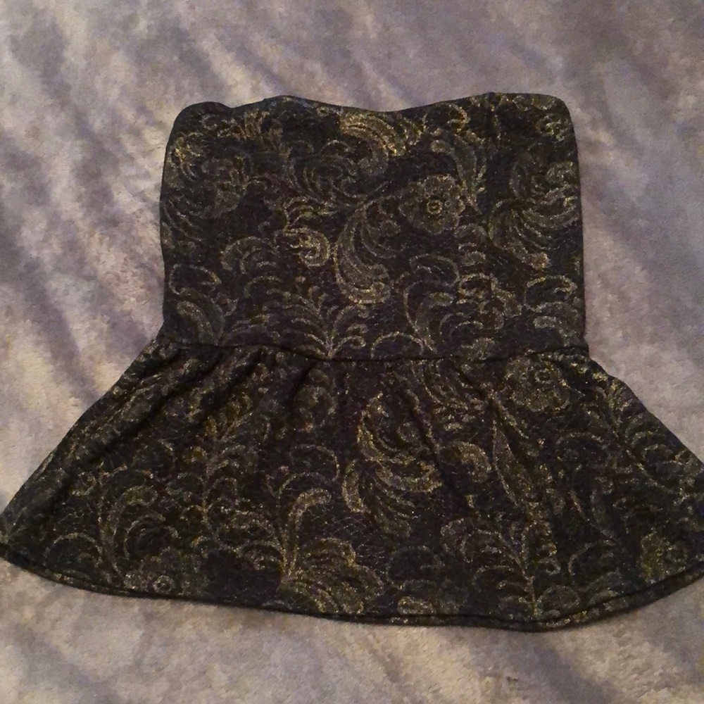 Strapless top with peplum flare